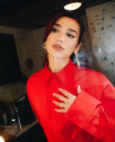 Dua Lipa Stuns In Vibrant Red Ensemble On Instagram