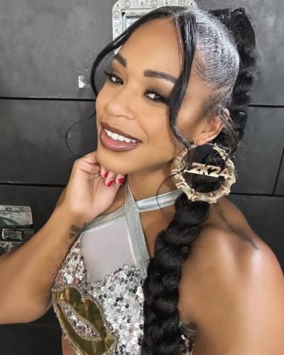 Bianca Belair Shines In Silver Selfie With Unmatched Charisma