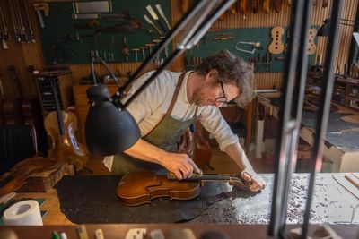 ‘Always respond to what the instrument is doing’: the Melbourne shop showcasing the rare craft of restoring violins