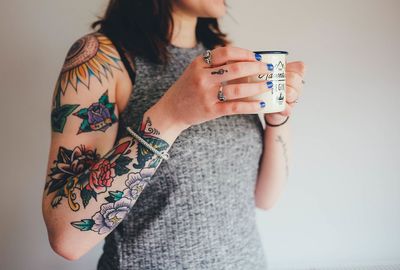 Woman Says She Was Rejected From Job Due To Her Tattoos: Sparks Discussion For Client Facing Roles