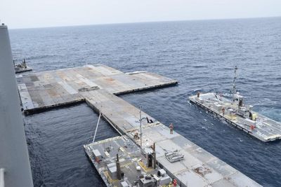 US military releases images of aid pier under construction off Gaza coast
