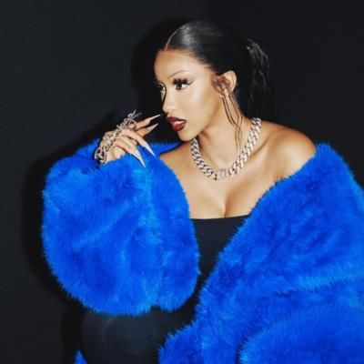Cardi B Stuns In Royal Blue Fur Jacket And Chic Jewelry