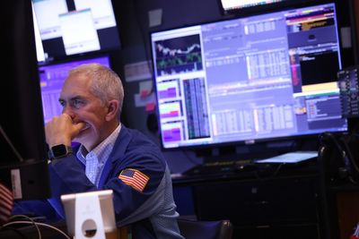 Stock Market Today: Stocks end mixed as markets debate Fed rate path