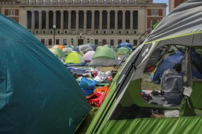 Police Officers Retreat From UCLA Encampment Amid Protester Confrontation