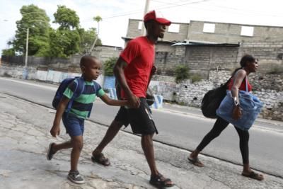 Gangs Siege Port-Au-Prince, Haiti, Sparking Mass Exodus