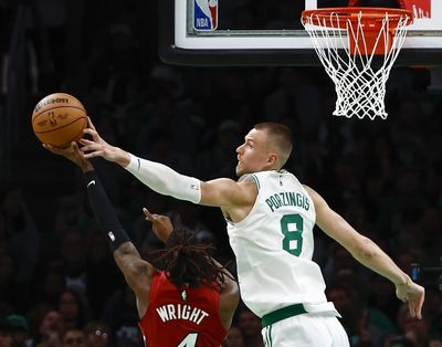 How should the Celtics re-integrate Porzingis after his injury?