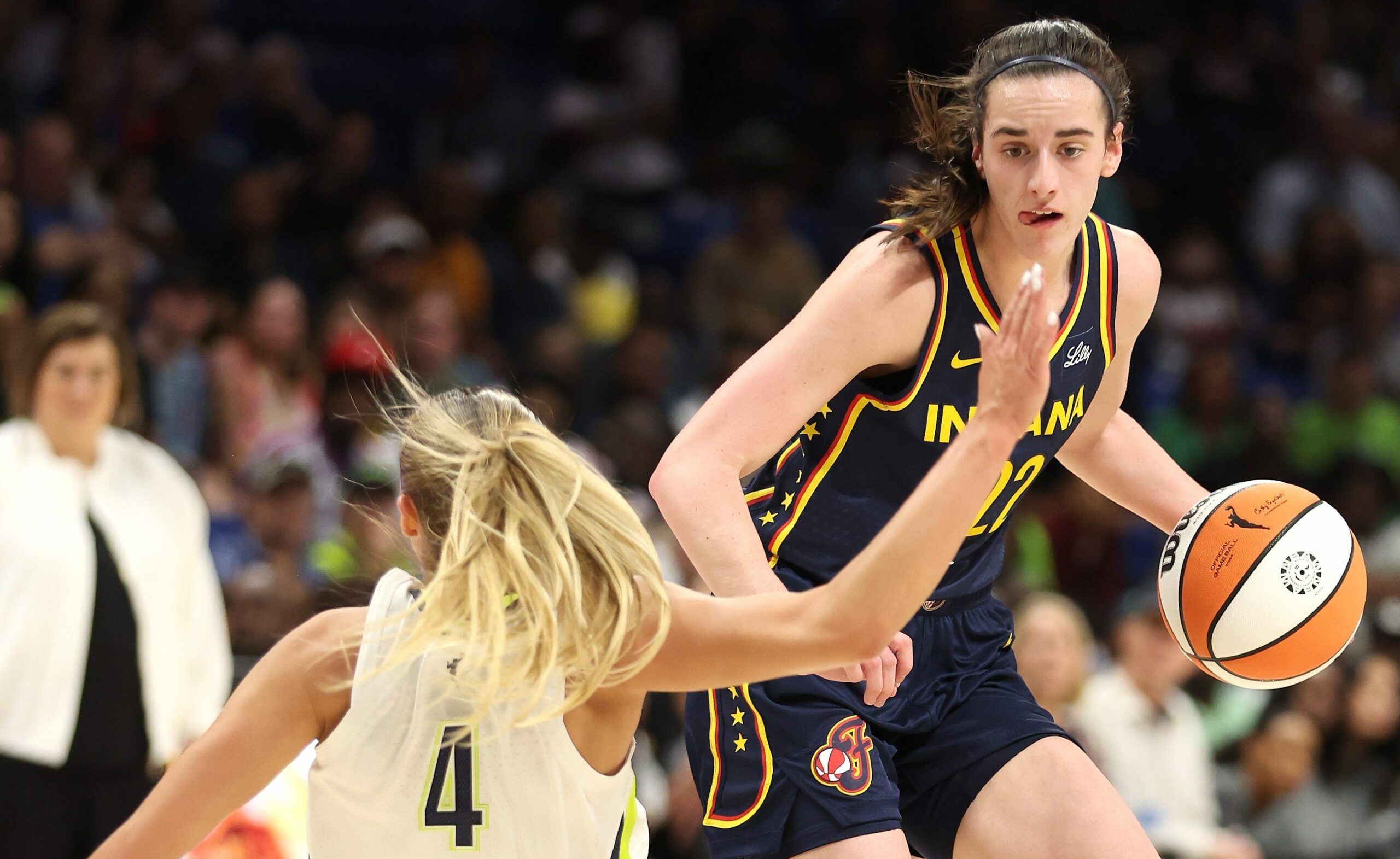 This Caitlin Clark photo of her dropping Jacy Sheldon…