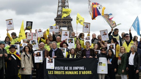 Uyghurs, Tibetans urge France to tackle human rights with Chinese president