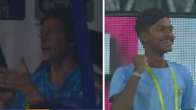 Ball boy over the moon as Jonty Rhodes applauds his stunning catch behind the fence. Watch