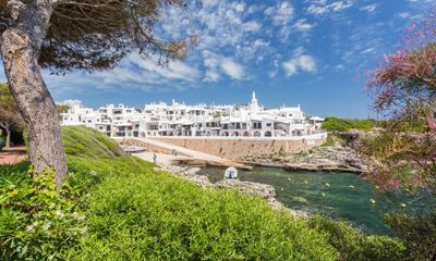 Menorca village threatens to close to tourists after explosion in numbers