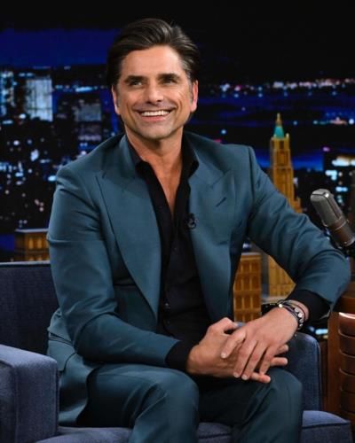 John Stamos Spreads Joy Through Dance With Friend