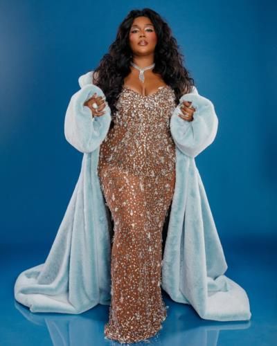 Lizzo's Whimsical Wonderland-Inspired Outfit Turns Heads At Event