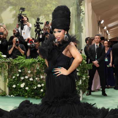 Cardi B Needs Five Men to Unravel the Train of Her 2024 Met Gala Gown