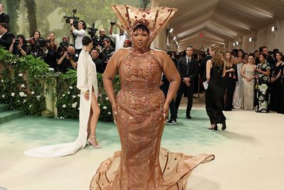 Lizzo Calls Critics “Fatphobic” As Her Met Gala Outfit Is Compared To Lampshades And Menstrual Cups