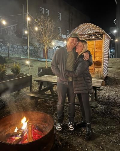 Intimate Moment: Justin Turner And Partner By The Fire