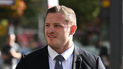 Woman cries as ex-NRL player cleared of groping claim