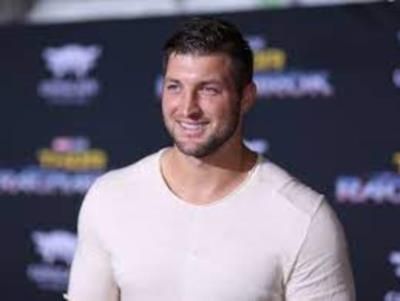 Tim Tebow's Heartwarming Moment With Partner And Dogs