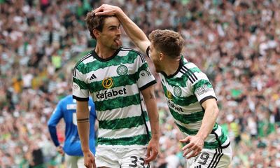 Matt O’Riley helps Celtic see off 10-man Rangers to all but secure Scottish title