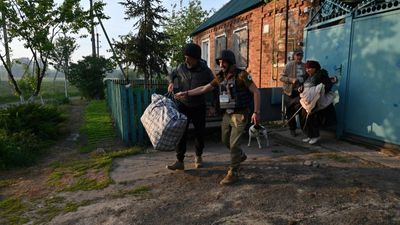 Russian attacks force hundreds to flee border area in Ukraine's Kharkiv region