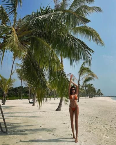 Andela Vukadinovic: Beach Chic Beauty In Orange Bikini Pose