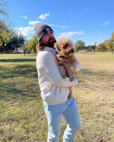 Celebrating A Special Bond: Ryan Vilade And His Furry Friend