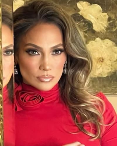 Jennifer Lopez Radiates Glamour In Hot Pink Ensemble