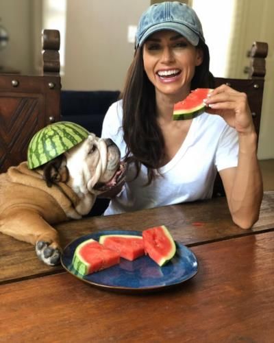 Joyful Summer Moment: Alexia Clark And Her Furry Friend