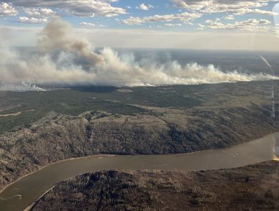 Evacuation orders issued as wildfire grows near Canada’s Alberta oil patch