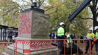 Colonial premier's statue toppled, spray-painted
