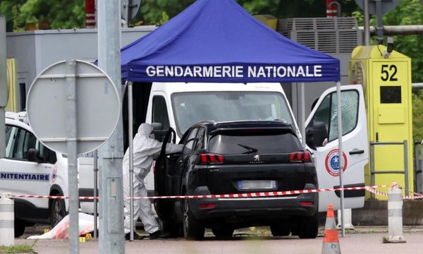 Protests at French prisons as search continues for gunmen who killed officers