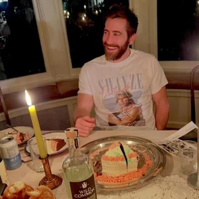 Jake Gyllenhaal Celebrates With Cake And Candle In Playful Moment