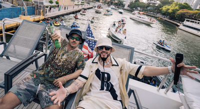 Urbano music powerhouses Feid, Yandel take over downtown Miami with unauthorized 'hang-out' and pop-up concert