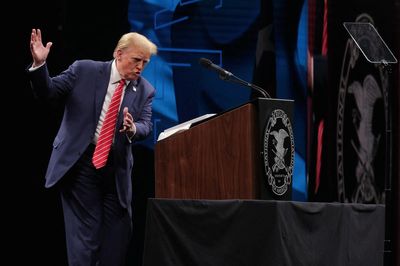 Trump claims ‘low IQ’ Biden only has to stay upright to be declared winner of debates in NRA speech: Live