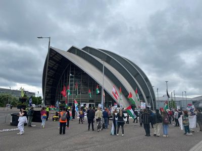 'Stop this madness': Lloyds bank summit disrupted by climate and Gaza protests