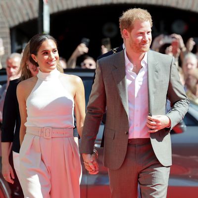 Meghan Markle Outfit Repeats in a White High-Neck Tank Top and Pleated Pants