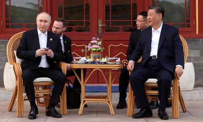 Putin visits China’s ‘Little Moscow’ as allies seek to cement economic ties – as it happened