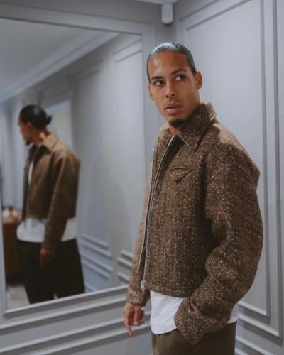 Virgil Van Dijk Stuns In Fashionable Attire Beside Mirror