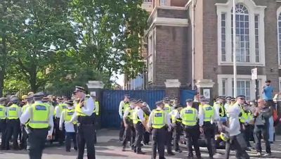 Arrests as police clash with protesters trying to stop asylum seekers being moved from London hotel
