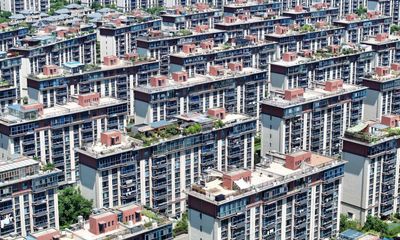 China to cut mortgage rates as part of plan to prop up property market