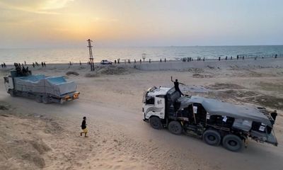 Supplies arrive in Gaza via new pier but land routes essential, says US aid chief