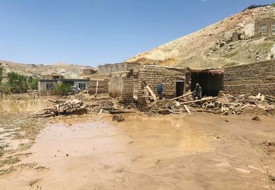 Flash floods due to unusually heavy seasonal rains kill at least 68 people in Afghanistan