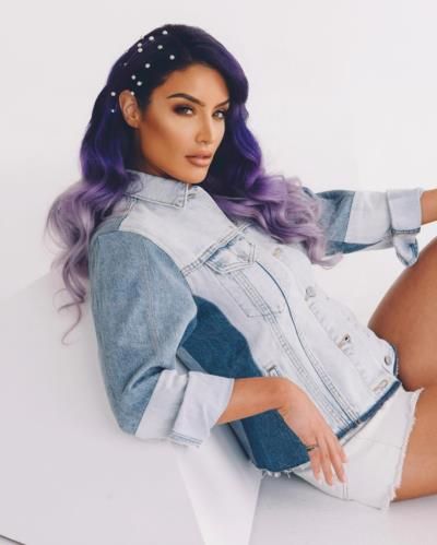 Natalie Eva Marie Stuns In Denim And Purple Hair