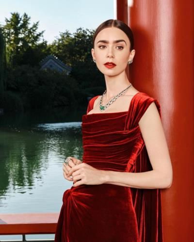 Lily Collins Radiates Elegance In Stunning Red Velvet Ensemble