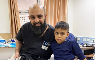 Australian doctor trapped in Gaza hospital begs government to evacuate medical team