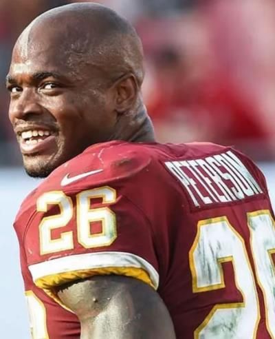 Adrian Peterson's Radiant Moment: A Snapshot Of Joy And Determination