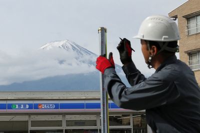 Japanese town blocks iconic Mount Fuji view to stop bad behaviour by tourists