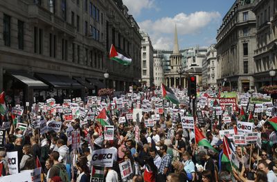 UK charges pro-Palestine protester behind divisive ‘coconut’ placard