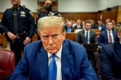 Trump backs down, won't testify at trial
