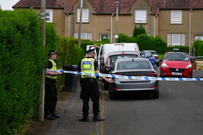 Woman dead and man arrested after weapon incident in Edinburgh street