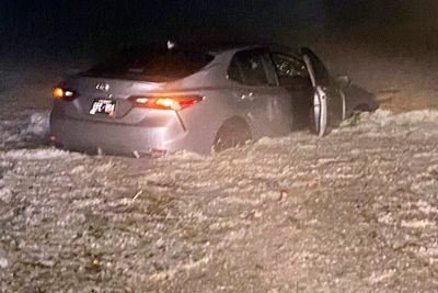 Heavy equipment, snow shovels used to clean up hail piled knee-deep in small Colorado city